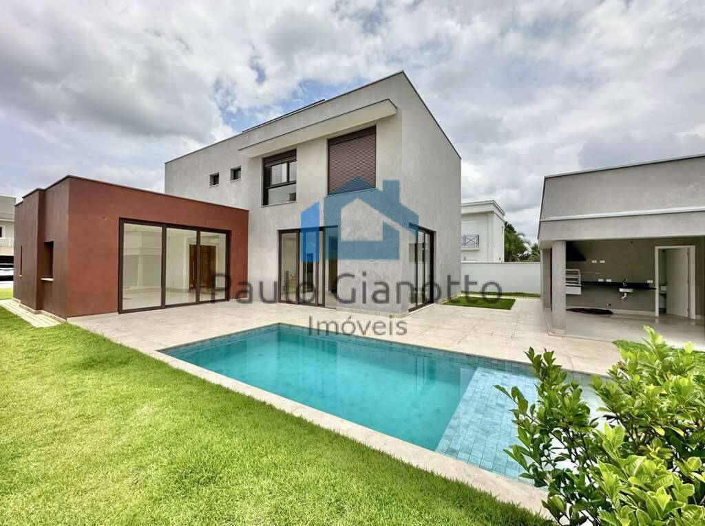Casa de Condomínio à venda e aluguel com 4 quartos, 307m² - Foto 1